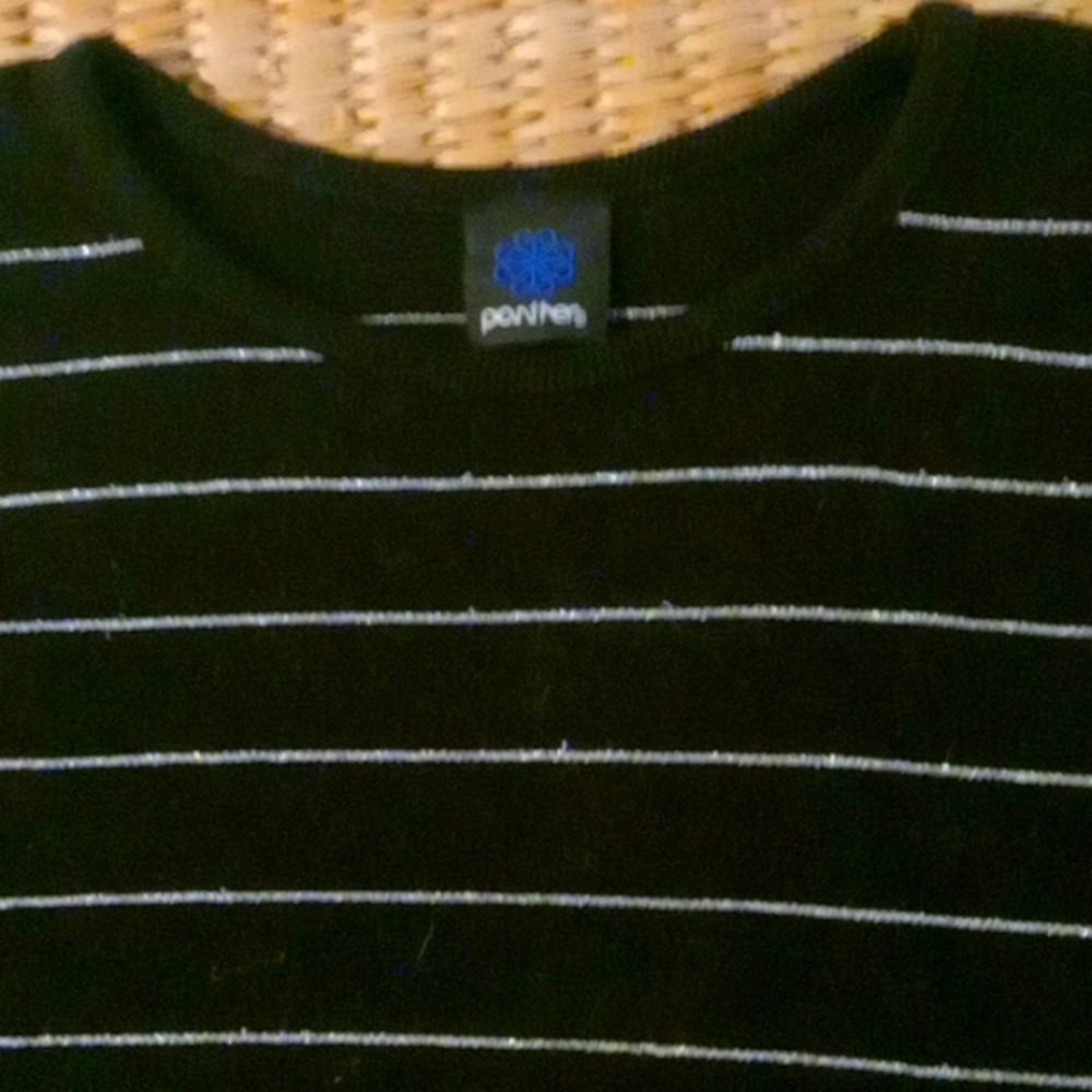 Short sleeved  Panther sweater size M